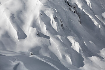 Fototapeta premium Snow covered mountains with fresh snow in Tyrol in Austria. Skiing in backcountry powder snow. 