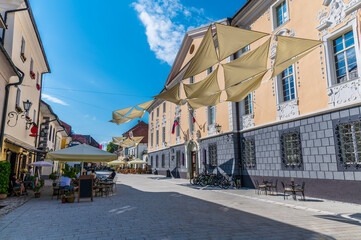 A view along the main street in the old town of Radovljica, Slovenia in summertime