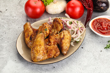 Grilled chicken wings with sauce
