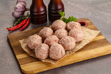 Raw homemade meatball for cooking