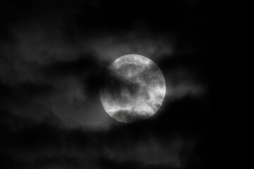 Naklejka na ściany i meble Halloween full moon in pitch black dark skies with clouds