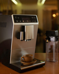 Modern espresso coffee machine with a cup in kitchen. - 631893124
