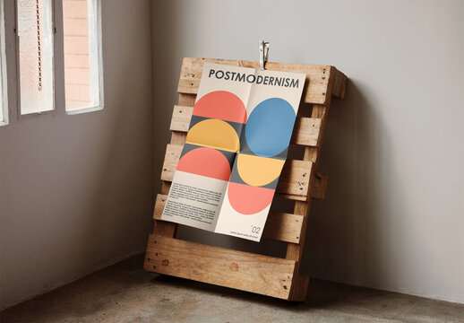 Mockup of customizable vertical A2 poster pinned to wooden crate