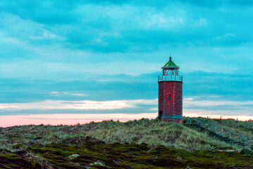 Fototapeta na wymiar Landscape with a lighthouse on Sylt island, Germany
