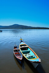 Boats in the bay of Antonina on the coast of the state of Paraná in southern Brazil. Mountains in the background.