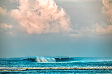 Breaking Waves on a partly cloudy day at Yanuca Island, Fiji