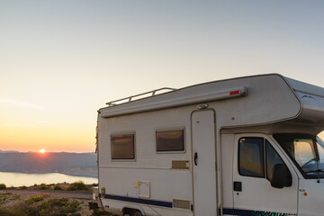 Caravan on coast at sunset, Spain