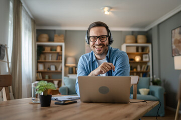 One man caucasian male freelancer work from home on laptop computer