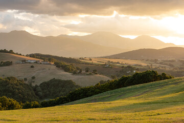 Sunset over the hills of the village of Arcevia in the province of Ancona in the Marche region of Italy.