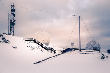 Arctic telecommunication station among snow rocks, Nuuk, Greenland © vadim.nefedov