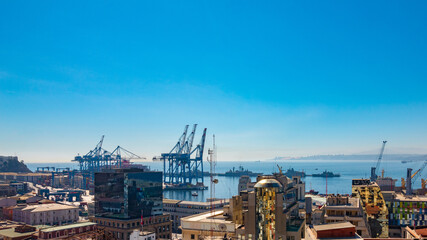 Fototapeta na wymiar ships, containers, boats and crane in the port of Valparaiso in Chile