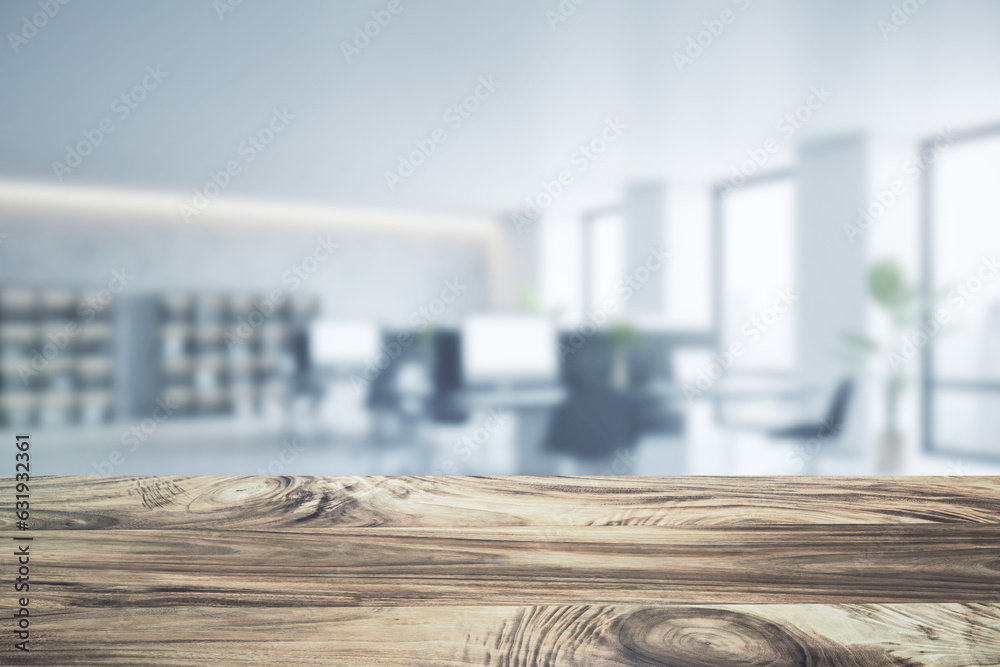 Poster close up of empty wooden desktop with product placement mock up place on blurry office interior back