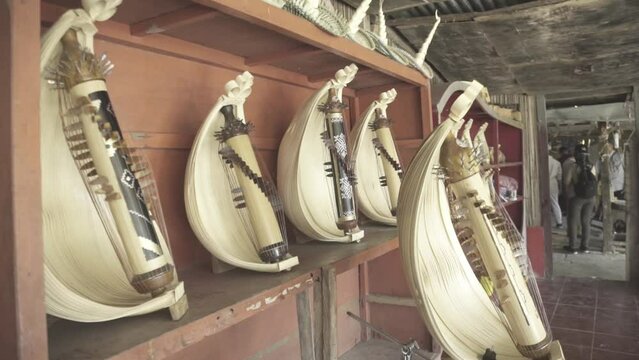 A large selection of Sasando in the gift store. Traditional stringed musical instruments from East Nusa Tenggara, Indonesia