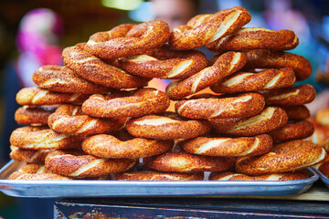 fresh Turkish bagels with sesame known as simits on a street market in Istanbul, Turkey