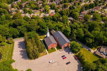 Aerial view of Saint Andrews Presbyterian Church in Scarborough green park in Toronto is a...