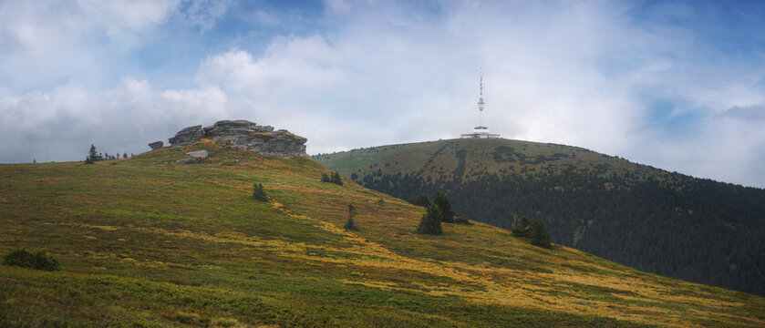Panoramic view of Praded (1491 mamsl - highest peak of the Silesia-Moravia region and the fifth highest in the Czech Republic) and Peter's Stones in Jesen&iacute;ky Mountains.
