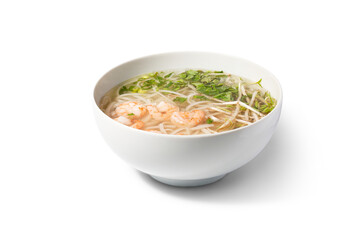 Pho soup with chicken in a bowl. The image is fully sharp, front to back. Clipping path.