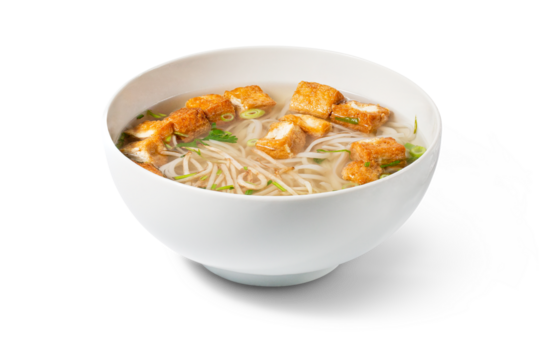Pho soup with chicken in a bowl. The image is fully sharp, front to back. Clipping path.