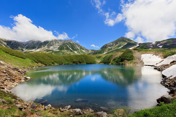 Obraz na płótnie Canvas Northern Alps Murodo and Mikurigaike Pond in early summer