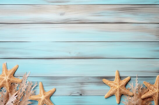 Photo of three starfish on a blue wooden background