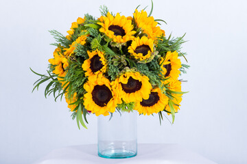 Beautiful bouquet arranged in a vase, on a white background