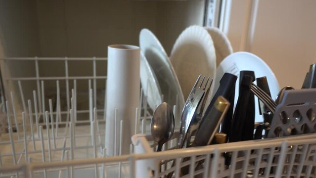 Earthquake Causing Dishes In Dishwasher To Rattle Around And Shake