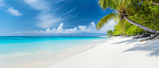 White sandy beach with bright blue water and sunshine background