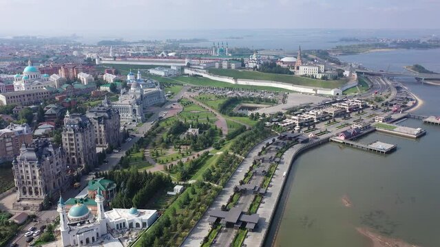 Aerial view of historical districts of Kazan on bank of Volga River overlooking ancient Kremlin on sunny summer day, Republic of Tatarstan, Russia