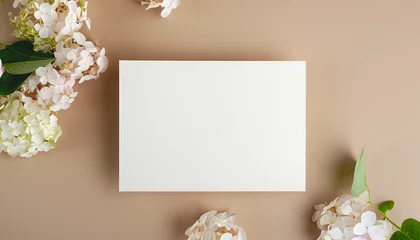 Poster white flowers on a wooden background,wallpaper, Top view, flat lay, copy space, Invitation card mockup with hydrangea flowers on beige pastel background, background © Baloushi