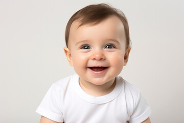 Fototapeta premium Closeup photo of a cute little baby boy child a smile and laugh isolated on white background