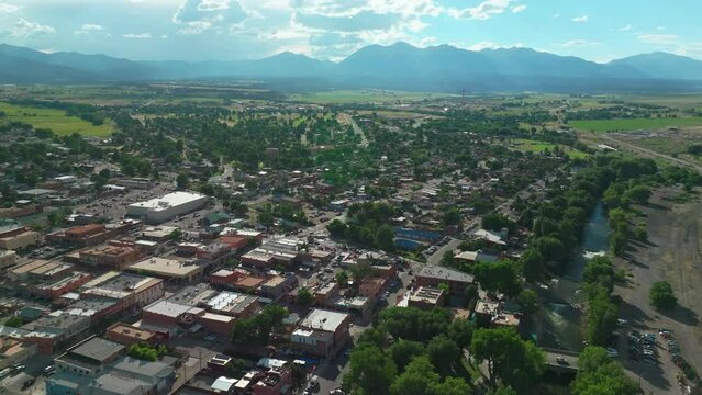 Salida Colorado aerial cinematic drone mid summer downtown S Lime Mill near Buena Vista on Arkansas River Riverside Park Scout surfing wave biking hiking rafting Rocky Mountain circling right movement