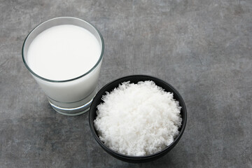Grated coconut (kelapa parut) on bowl, food preparation
