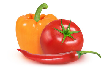 Chili pepper, orange pepper and tomato on an isolated white background.