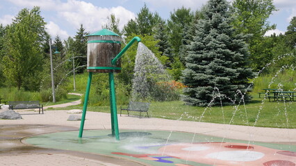 Water splash pad in a park.