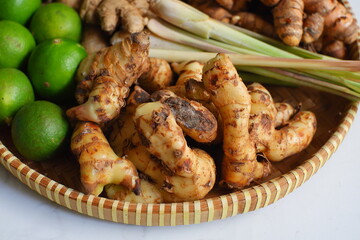 Galangal root in a bamboo tray
