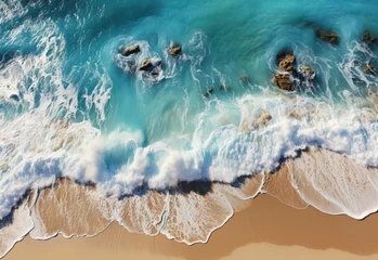 Sierkussen Overhead photo of crashing waves on the shoreline. Tropical beach surf. Abstract aerial ocean view, Aerial view of the waves crashing on the beach. Shot from a drone © ND STOCK