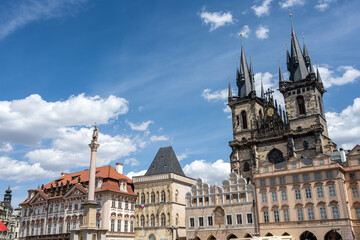 Fototapeta na wymiar Beautiful historic buildings and the Tyn Church at the Old Town Square on Prague, Czech Republic