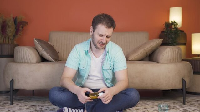 The man who wants to commit suicide by taking pills.