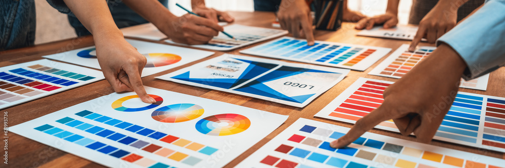 Poster graphic designer brainstorm logo and graphic art at busy creative studio workshop. experiment and br
