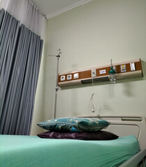 Selective focus. The bed for the patient is empty in the bedroom at Tugu Hospital.