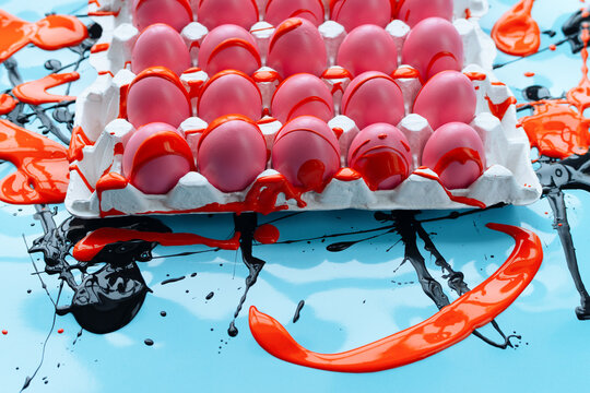 Peculiar method of Easter eggs painting: they covered with bright pink color, rubbed with vegetable oil and decorated with orange color splashes