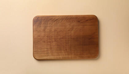 One wooden board on beige background, top view. Space for text