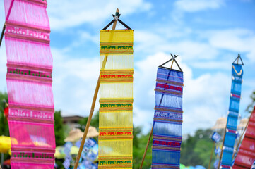 Colorful fabric flags adorn the parade