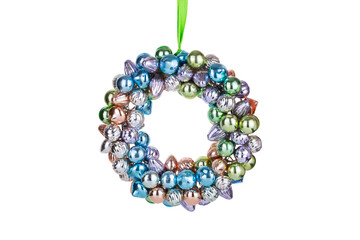 christmas wreath of blue, green, peach glass shiny balls isolated on white background with clipping path. New Year decoration