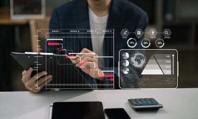 Project manager working and update tasks with milestones progress planning and professional...