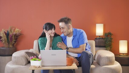 Couple watching movie. Romantic moment.