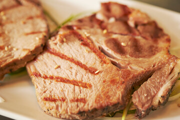 Grilled pork belly on a plate