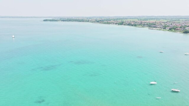 Greenish aquamarine Lido beach Galeazzi Sirmione Italy 