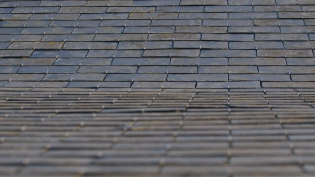 Interlocking Roof Tile Of The Residential House. - closeup, tilt up