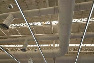 White Air Condition Pipes on the Ceiling.